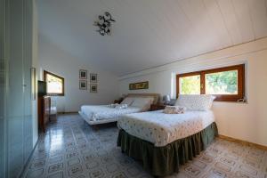 A bed or beds in a room at Casa Clara