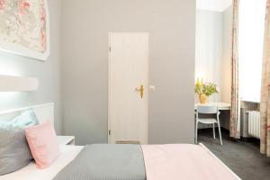 Postel nebo postele na pokoji v ubytování W22 Hotel am Kurfürstendamm