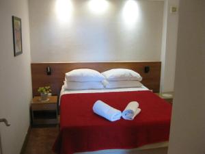Tempat tidur dalam kamar di Apartments Topolo Dubrovnik