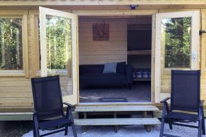 Posezení v ubytování Cozy Lodge in Värmland Sweden