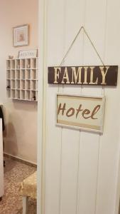 a sign that reads family motel hanging on a door at Hotel Maeva ,1 star B&B in Lloret de Mar