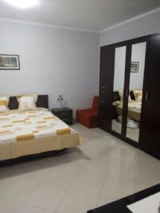 Postel nebo postele na pokoji v ubytování Apartman Ráchegy