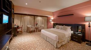 TV a/nebo společenská místnost v ubytování Almsakn Alola Hotel Company