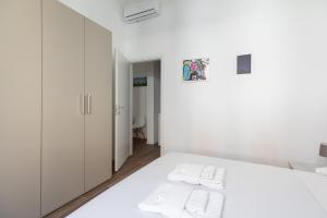 Postel nebo postele na pokoji v ubytování Minerva - 2 bedrooms apartment two steps from Milano Centrale
