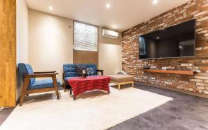 TV a/nebo společenská místnost v ubytování Incheon Soma Hotel + 15 fotografií