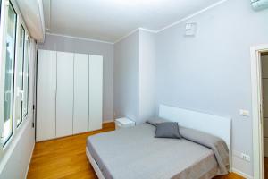 Posteľ alebo postele v izbe v ubytovaní Casa Baia Blu