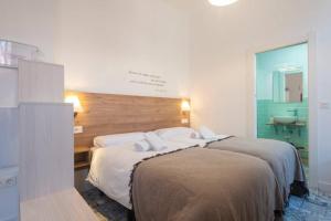 Postel nebo postele na pokoji v ubytování Rosarioseis LOFT MIRADOR DE MORAYMA