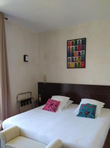 Postel nebo postele na pokoji v ubytování hôtel Le Synaya