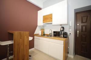 Kuchyňa alebo kuchynka v ubytovaní Coffee Apartments Espresso 6C