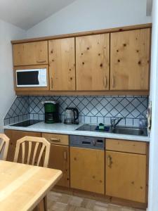 Kuchyň nebo kuchyňský kout v ubytování Appartements Wilma