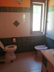 Kúpeľňa v ubytovaní Monolocale zona Mare Pisturri