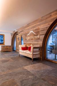 Postel nebo postele na pokoji v ubytování Hotel Majon Miramonti