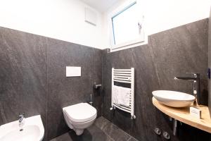 Koupelna v ubytování Hotel Majon Miramonti