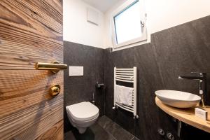 Koupelna v ubytování Hotel Majon Miramonti