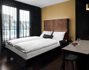 Postel nebo postele na pokoji v ubytování Hotel ZOE by AMANO