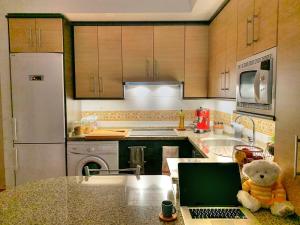 Kuchyň nebo kuchyňský kout v ubytování Charming Flat in Torrox Costa