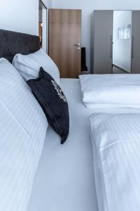 Łóżko lub łóżka w pokoju w obiekcie Apartment Tauernfex Kaprun