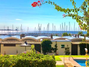 a view of the marina from the yard of a house at Balco d’es Trenc in Sa Ràpita