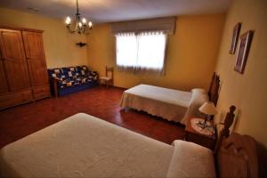 Postel nebo postele na pokoji v ubytování Casa de Padrón + 27 fotografií