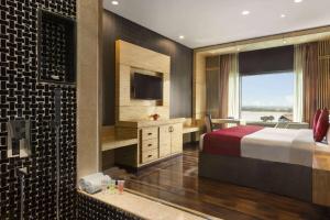 Ramada by Wyndham Alleppey客房内的一张或多张床位