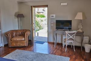 TV a/nebo společenská místnost v ubytování Tenuta EDONE' Country House