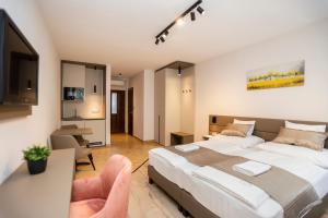 Krevet ili kreveti u jedinici u okviru objekta Végvár Spa Apartman