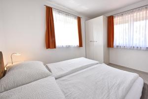 Postel nebo postele na pokoji v ubytování Tomic Apartments