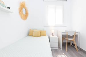 Posteľ alebo postele v izbe v ubytovaní Sun & Beach Malaga City Center + 7 fotografií