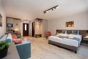 Krevet ili kreveti u jedinici u okviru objekta Végvár Spa Apartman