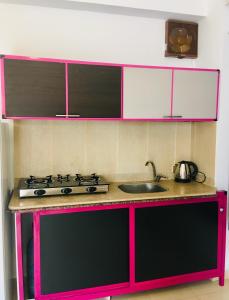 A cozinha ou cozinha compacta de Villa 22