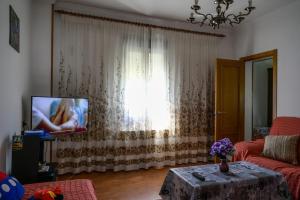 TV a/nebo společenská místnost v ubytování CASA DIEGO