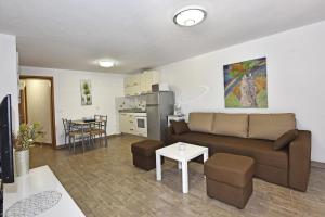 Kuchyň nebo kuchyňský kout v ubytování Tomic Apartments