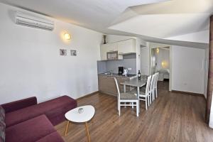 Kuchyň nebo kuchyňský kout v ubytování Tomic Apartments