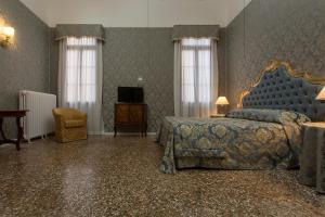 TV a/nebo společenská místnost v ubytování palazzo suite ducale