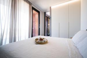 Postel nebo postele na pokoji v ubytování PICCOLA MAESTA' boutique rooms
