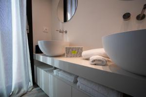 Postel nebo postele na pokoji v ubytování PICCOLA MAESTA' boutique rooms