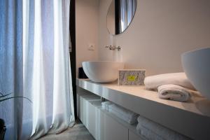 Postel nebo postele na pokoji v ubytování PICCOLA MAESTA' boutique rooms