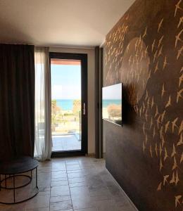 TV a/nebo společenská místnost v ubytování PICCOLA MAESTA' boutique rooms