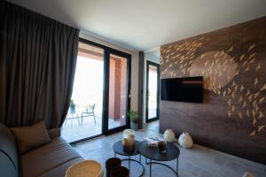 TV a/nebo společenská místnost v ubytování PICCOLA MAESTA' boutique rooms