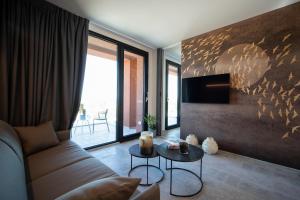 TV a/nebo společenská místnost v ubytování PICCOLA MAESTA' boutique rooms