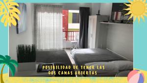 ラスパルマス・デ・グランカナリアにあるCool Canterasのベッドルーム1室(ベッド1台付)