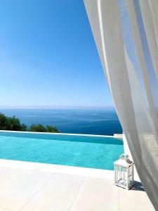 a view of a swimming pool from a villa at PARGA Villas Collection in Parga