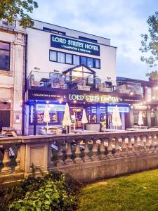 a building with a restaurant in front of it at The Lord Street Hotel; BW Signature Collection in Southport