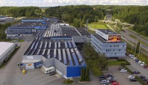 an overhead view of a building with a parking lot at Hotel Salora in Salo