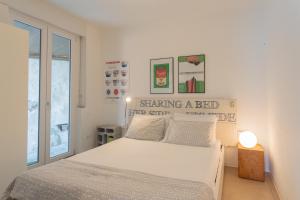 Katil atau katil-katil dalam bilik di La Casa dell'Architetto by Rent All Como
