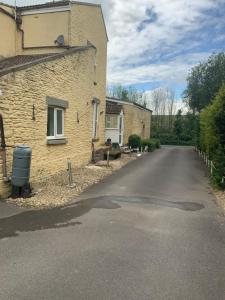 an empty road in front of a house at Old Gloucester Road farm bed and breakfast in Bristol