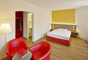 Voodi või voodid majutusasutuse Sorell Hotel Arabelle toas