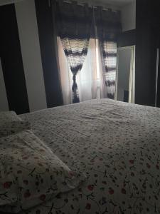 A bed or beds in a room at Il Castellaccio