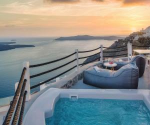 a hot tub on the deck of a cruise ship at Windmill Villa in Imerovigli