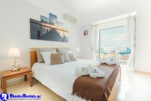 Posteľ alebo postele v izbe v ubytovaní Gennadi Dreams Holiday Villa